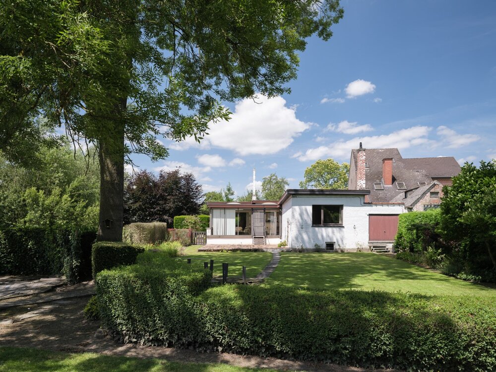 Op te frissen bungalow in een groene oase in Herdersem Op te frissen bungalow in een groene oase in Herdersem