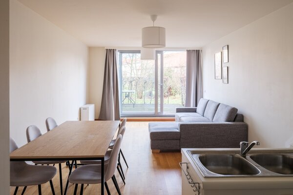 Te koop - Stijlvol gelijkvloers wonen aan het water in Gent