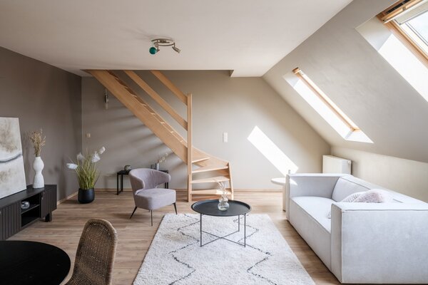 Te koop - Licht en ruim appartement met terras in hartje Astene