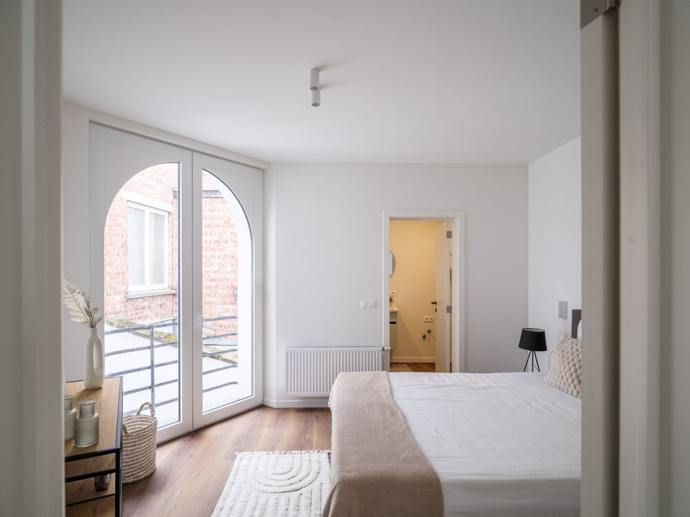 volledig-gerenoveerde-opbrengsteigendom-met-zes-appartementen-nabij-gent-sint-pieters-09080407_19.jpg